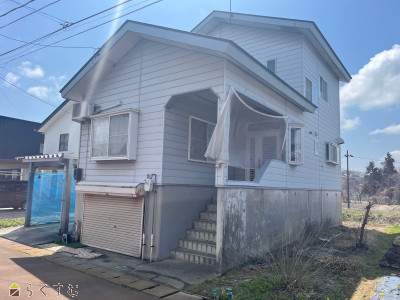 上越売買不動産　小千谷市大字薭生　中古住宅  頑丈な鉄骨車庫付き（１台分